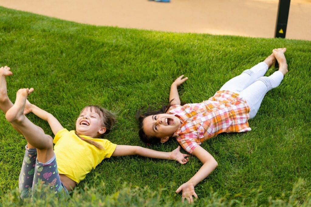 Happy children playing outdoors, children on the playground